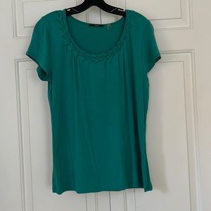 Teal top by Tahiti in good preloved condition.